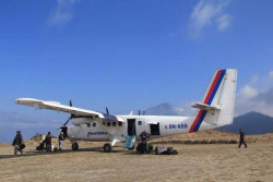 Plane lands at Suketar Airport, Taplejung